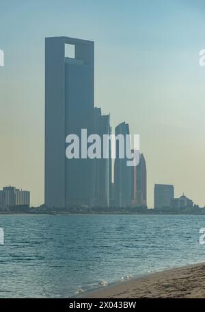 A picture of the Etihad Towers and the Abu Dhabi National Oil Company Headquarters as seen from afar. Stock Photo