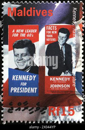 Old posters for the presidential campaign of JFK on stamp Stock Photo
