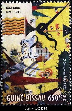 Painting by Joan Mirò on stamp from Guinea Bissau Stock Photo