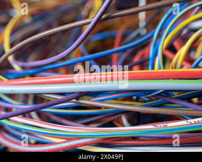 Close-up of confused mixed multi-colored wires Stock Photo