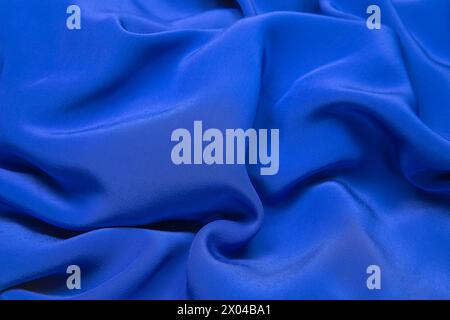 Dark blue fabric cloth texture and textile background. Stock Photo