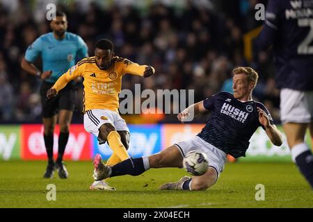 London, UK. 09th Apr, 2024. Zian Flemming of Millwall blocking Ricardo Pereira of Leicester City's shot during the Millwall FC v Leicester City FC sky bet EFL Championship match at The Den, London, England, United Kingdom on 9 April 2024 Credit: Every Second Media/Alamy Live News Stock Photo