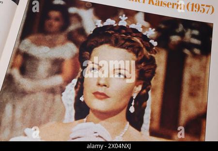 Viersen, Germany - March 9. 2024: Closeup of magazine page with scene from Sissi Movie from 50s with Romy Schneider as Empress Elisabeth from Austria Stock Photo