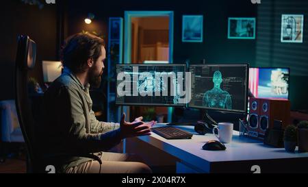 Man feeling speechless after seeing AI gaining anthropomorphic form and consciousness, waving hand to salute him. Computer engineer surprised by sentient artificial intelligence greeting him, camera B Stock Photo