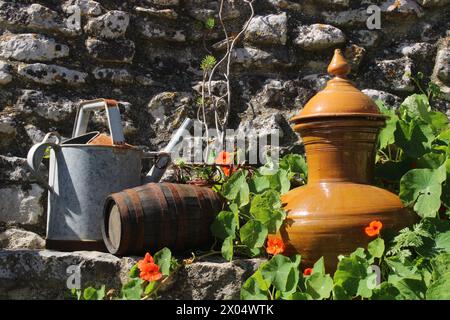 Watering can, barrel and clay pot Stock Photo