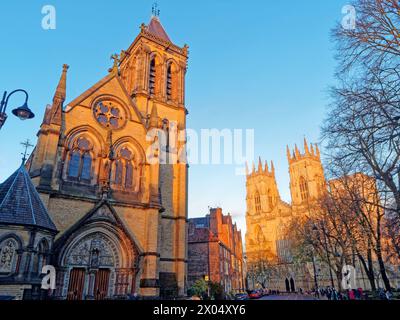 UK, North Yorkshire, York, York Oratory, Towers and West Face of York Minster from Museum Street. Stock Photo