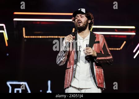 Milan, Italy. 09th Apr, 2024. Riccardo Zanotti of Pinguini Tattici Nucleari performs live on stage during Palasport 2024 at Forum on April 09, 2024 in Assago, Italy Credit: Live Media Publishing Group/Alamy Live News Stock Photo