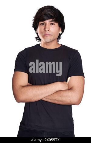 A man stands with his arms crossed, striking a confident pose for a photo. He looks directly at the camera, showcasing his self-assured demeanor. Stock Photo