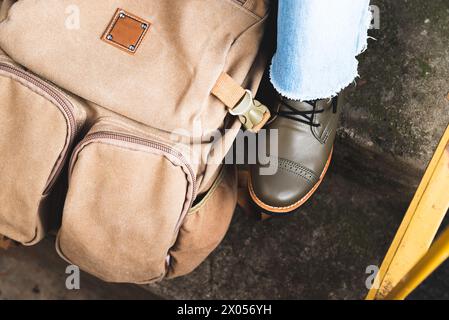 women's leather boots and fashionable urban style backpack Stock Photo
