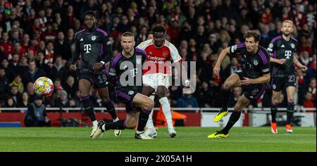 London, UK. 10th Apr, 2024. Arsenal's Bukayo Saka (3rd L) scores the opening goal during the UEFA Champions League quarterfinal 1st Leg match between Bayern Munich and Arsenal in London, Britain, April 9, 2024. Credit: Xinhua/Alamy Live News Stock Photo