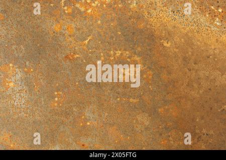 pitted and rusted sheet metal surface for background texture Stock Photo
