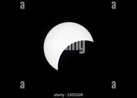 Super-telephoto image of the total eclipse in the United States. The photo was taken at an eclipse watching party in a Walmart parking lot in Flora, I Stock Photo
