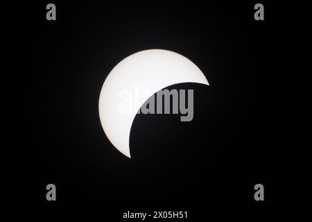 Super-telephoto image of the total eclipse in the United States. The photo was taken at an eclipse watching party in a Walmart parking lot in Flora, I Stock Photo