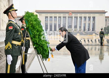 Beijing, China. 10th Apr, 2024. President of the Federated States of Micronesia Wesley W. Simina lays a wreath at the Monument to the People's Heroes on the Tian'anmen Square in Beijing, capital of China, April 10, 2024. Credit: Yin Bogu/Xinhua/Alamy Live News Stock Photo