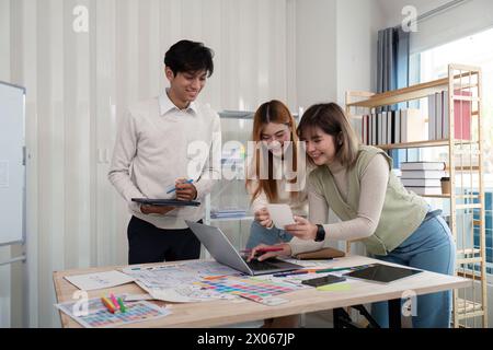 Brainstorm team of creative web graphic designer planning. Creative designers present ux ui to team. Designers team working meeting in office Stock Photo