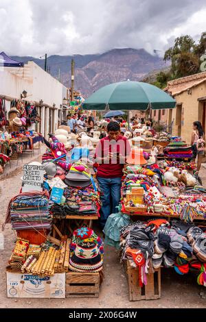 Woven Goods and Souvenirs For Sale At The Artisan Market On The Plaza, Purmamarca, Jujuy Province, Argentina. Stock Photo