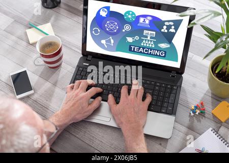 Teaching concept shown on a laptop used by a man Stock Photo