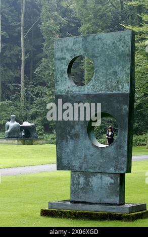 “Squares With Two Circles“ (1963) sculpture by Barbara Hepworth in Kröller-Müller Museum garden, Het Nationale Park De Hoge Veluwe. Gelderland, Nether Stock Photo