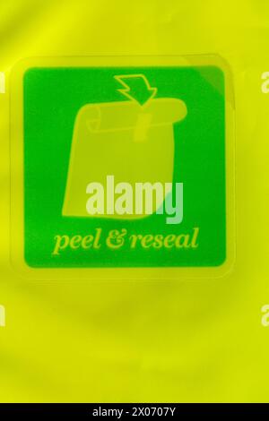 peel & reseal Reclosable sticker on packet of  M&S milk chocolate sea Salt Fudge Bites Stock Photo
