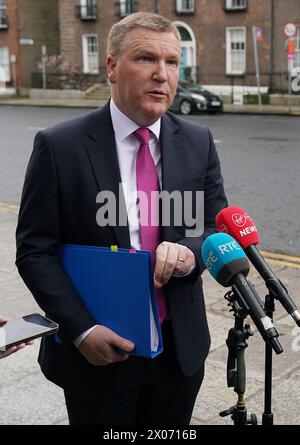 Minister for Finance Michael McGrath speaking to media as he arrives for a cabinet meeting at Government Buildings in Dublin. Simon Harris yesterday completed his first task after becoming Ireland’s youngest Taoiseach by filling Cabinet vacancies. Picture date: Wednesday April 10, 2024. Stock Photo