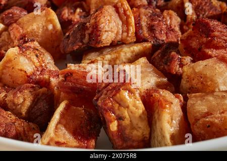 Cubes of cooked pork belly made in an air fryer Stock Photo