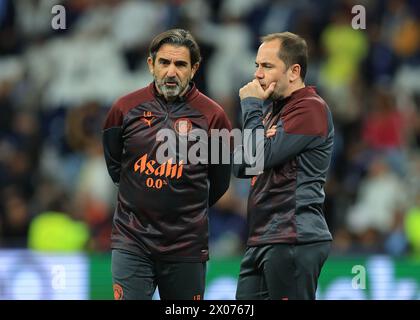 Madrid, Spain. 9th Apr, 2024. Manchester City fitness coach Lorenzo Buenaventura (L) and first team coach Inigo Dominguez during the UEFA Champions League match at the Santiago Bernabau, Madrid. Picture credit should read: Paul Terry/Sportimage Credit: Sportimage Ltd/Alamy Live News Stock Photo