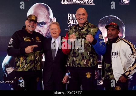 John Fury, promoter Frank Warren, Tyson Fury and trainer SugarHill Steward (left-right) during a press conference at the The Mazuma Mobile Stadium, Morecambe. Tyson Fury faces Oleksandr Usyk in the 'Ring of Fire' undisputed world heavyweight title fight in Riyadh, Saudi Arabia on 18 May 2024. Picture date: Wednesday April 10, 2024. Stock Photo