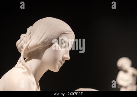 Close-up on profile of marble statue of young woman Stock Photo