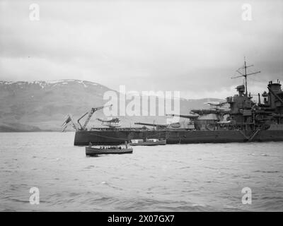 SHIPS AT HVALFJORD, ICELAND. 10 TO 22 NOVEMBER 1941, ON BOARD THE TRIBAL CLASS DESTROYER HMS ASHANTI. - USS MISSISSIPPI, US battleship, showing seaplanes on the quarterdeck Stock Photo