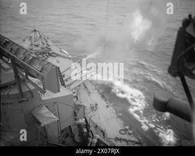 ON BOARD THE BATTLESHIP HMS PRINCE OF WALES. JUNE 1941. - 14' guns of HMS PRINCE OF WALES firing Stock Photo
