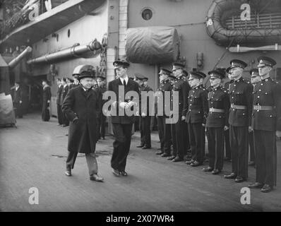 From 12 to 21 December, Winston Churchill traveled to America aboard HMS Duke of York, with Lord Beaverbrook passing a guard of honour of Marines on arrival. Stock Photo