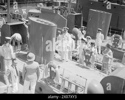 HANDING OVER OF THE FIRST FAIRMILE MOTOR TORPEDO BOATS TO BE BUILT IN MALAYA. 3 DECEMBER 1941, SINGAPORE. - The C in C Singapore, Admiral Sir Geoffrey Layton inspects the new craft. He is standing by the funnel Stock Photo