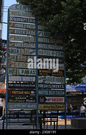 Pokhara, Nepal - November 20 2023: the road signs of guest house in lakeside, pokhara. Tourism is the main economic sources in Nepal. Stock Photo