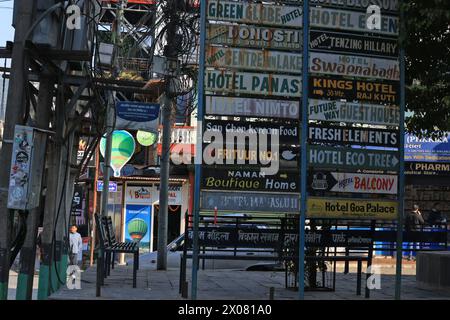 Pokhara, Nepal - November 20 2023: the road signs of guest house in lakeside, pokhara. Tourism is the main economic sources in Nepal. Stock Photo