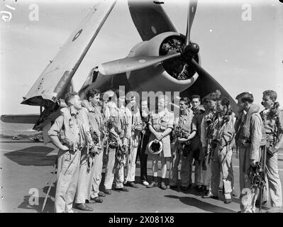 THEY BATTERED SURABAYA. 5 TO 27 MAY 1944, ON BOARD THE AIRCRAFT CARRIER HMS ILLUSTRIOUS IN THE INDIAN OCEAN. SCENES ON BOARD THE ILLUSTRIOUS WHEN AN AIRSTRIKE BY BRITISH, AMERICAN, AUSTRALIAN, FRENCH, AND DUTCH UNITS, WAS CARRIED OUT AGAINST THE JAPANESE-HELD NAVAL BASE. - 830 Squadron, Chance-Vought Corsair pilots, some of whom took part in the raid Stock Photo