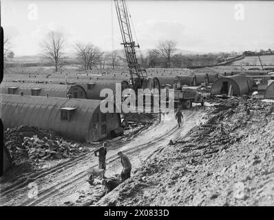 AMERICANS IN BRITAIN, 1942 - 1945 - The Londonderry Naval Base: Construction in progress at the Londonderry Naval Base. General view of the site showing the type of hut that was used  United States Navy Stock Photo