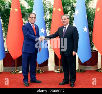 Beijing, China. 10th Apr, 2024. Chinese Premier Li Qiang meets with President of the Federated States of Micronesia (FSM) Wesley W. Simina at the Great Hall of the People in Beijing, capital of China, April 10, 2024. Credit: Liu Weibing/Xinhua/Alamy Live News Stock Photo