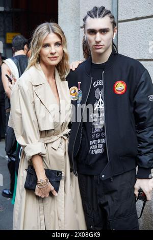 MILAN, ITALY - FEBRUARY 21 , 2024: Martina Colombari before Iceberg fashion show, Milan Fashion Week street style Stock Photo