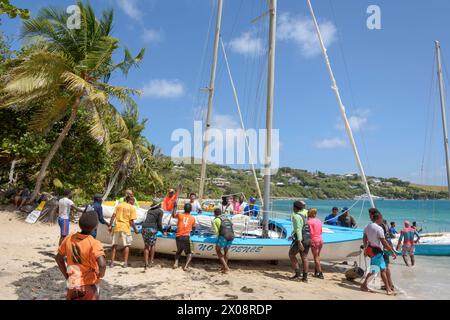 Sunday yacht race in Friendship Bay, Bequia Island, St Vincent & the Grenadines, Caribbean Stock Photo