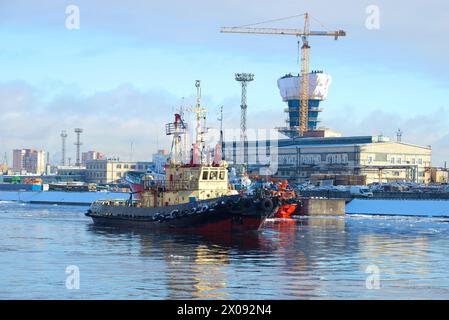 SAINT PETERSBURG, RUSSIA - FEBRUARY 17, 2016: The harbor tug 'Mercury' (IMO: 8832631) is on the anonersky canal February afternoon Stock Photo
