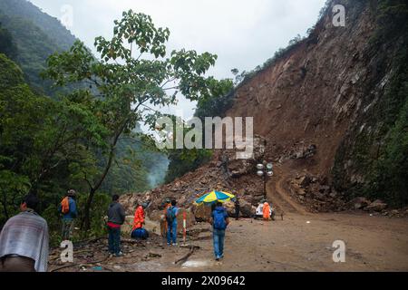 A massive landslide covers the road between Huanuco and Tingo Maria in the Peruvian Andes where erosion is common Stock Photo