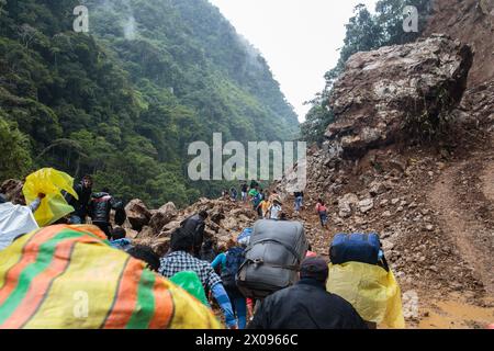 A massive landslide covers the road between Huanuco and Tingo Maria in the Peruvian Andes where erosion is common Stock Photo