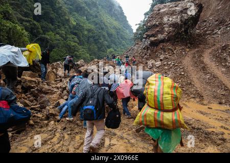 A massive landslide covers the road between Huanuco and Tingo Maria in the Peruvian Andes where erosion is common Stock Photo