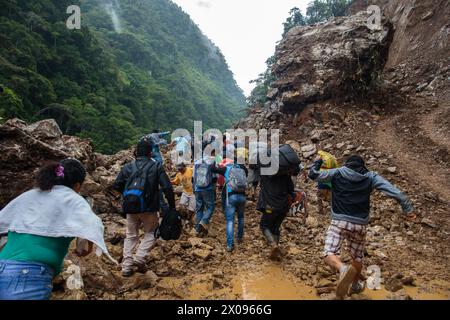 A massive landslide covers the road between Huanuco and Tingo Maria in the Peruvian Andes where erosion is common Stock Photo