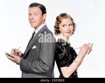 George Murphy, Josephine Hutchinson, on-set of the film, 'The Women Men Marry', MGM, 1937 Stock Photo