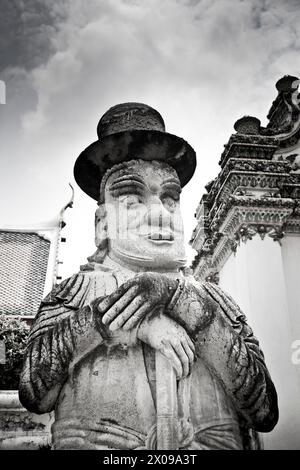 A statue of a Farang Guard once used as ballast in a chinese merchant ship, Grand Palace, Bangkok, Thailand Stock Photo