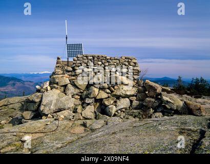 Middle Sister Groundhouse (fire tower) on Middle Sister Mountain in Albany, New Hampshire USA. This fire tower was in operation from 1927-1948. Stock Photo