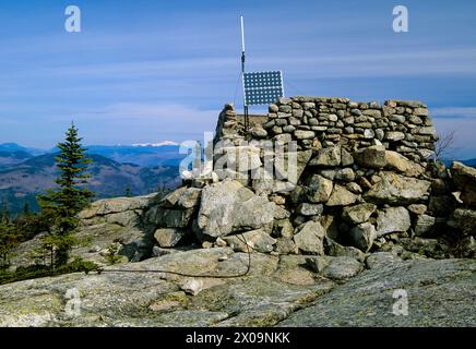 Middle Sister Groundhouse (fire tower) on Middle Sister Mountain in Albany, New Hampshire USA. This fire tower was in operation from 1927-1948. Stock Photo