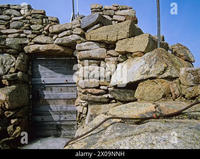 Middle Sister Groundhouse (fire tower) on Middle Sister Mountain in Albany, New Hampshire USA. This fire tower was in operation from 1927-1948. Stock Photo