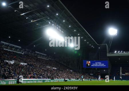 A tribute to West Bromwich Albion fan Carl Phillips on the big screen during the Sky Bet ...